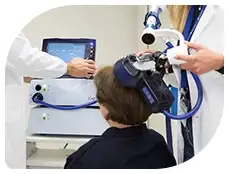 Patient receiving Transcranial Magnetic Stimulation (TMS) treatment for depression at Reliant Family Psychiatry, featuring advanced technology and expert care